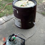 This is a 23 gallon lard kettle that I bought at a flea market last summer. The stand was made by cutting an old fuel tank in half using a plasma cutter. There is an 11 inch propane burner mounted under the kettle that provides the heat.