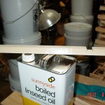 One of the Oak mouse guards setting on top of a gallon of bioled linseed oil.